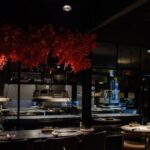 Cómo es el exclusivo restaurante con dos estrellas Michelin elegido por Bad Bunny para una noche gourmet